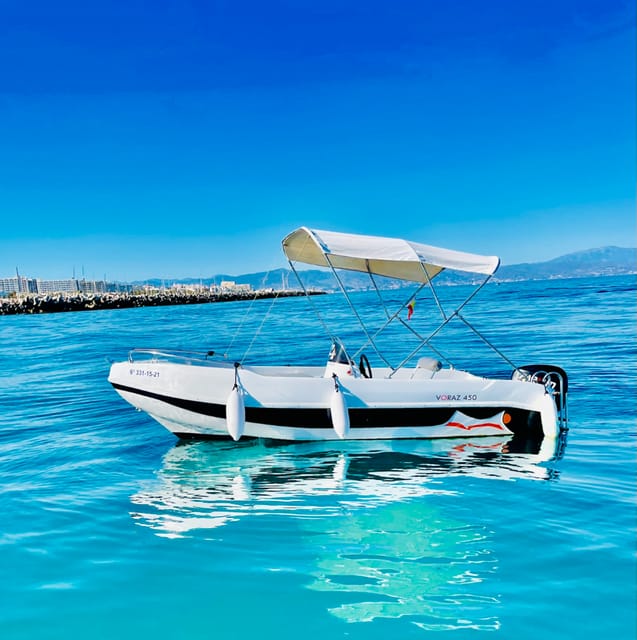Benalmadena: 6-Seater Speedboat license-free Boat Rental - The boat experience: stable tri-hull ride, padded solarium, and shade where it counts