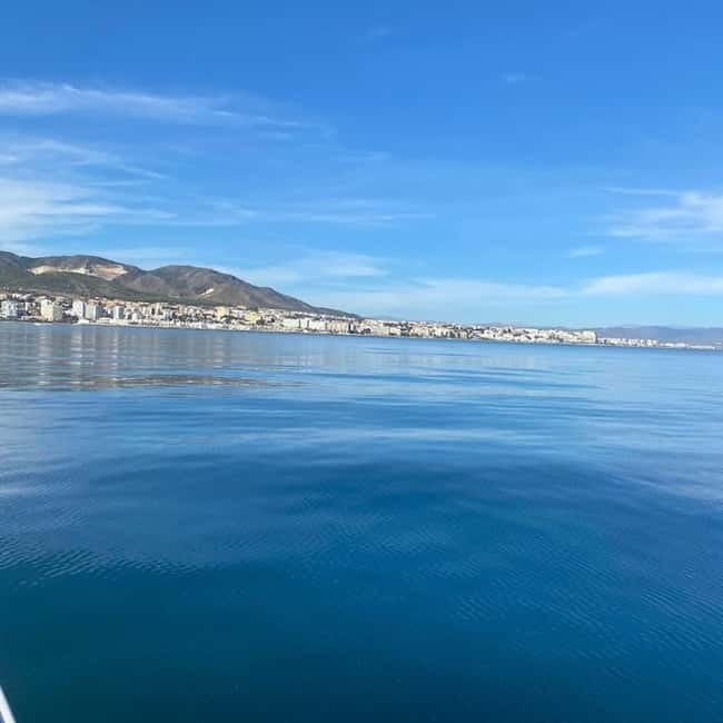 Benalmadena: Boat Rental with No License Required - The Costa del Sol route: Málaga coast scenery, photos, and dolphin odds
