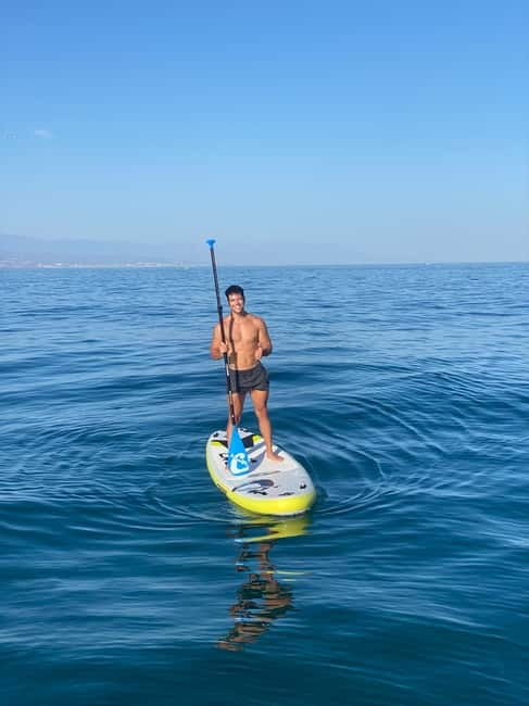 Benalmádena Boat Tour with Snorkeling, Water Slide and Lunch - Kayaks and paddle boards: relaxing pace, better coastline viewing