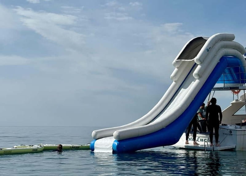 Benalmádena Boat Tour with Snorkeling, Water Slide and Lunch - Swimming and jumping time: how to make the most of the free water