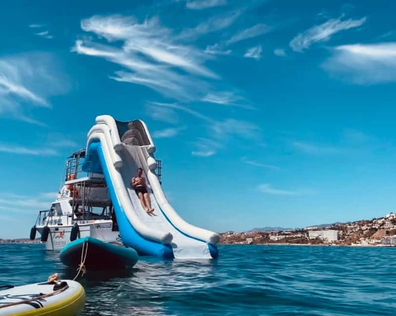 Benalmádena Boat Tour with Snorkeling, Water Slide and Lunch - Dolphin watching from Benalmádena: what you’re actually doing out there