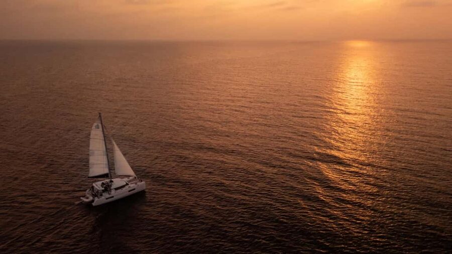 Benalmádena: Catamaran with dolphin watching and drinks - Benalmádena Sunset from a Catamaran: When the Coast Turns into Color