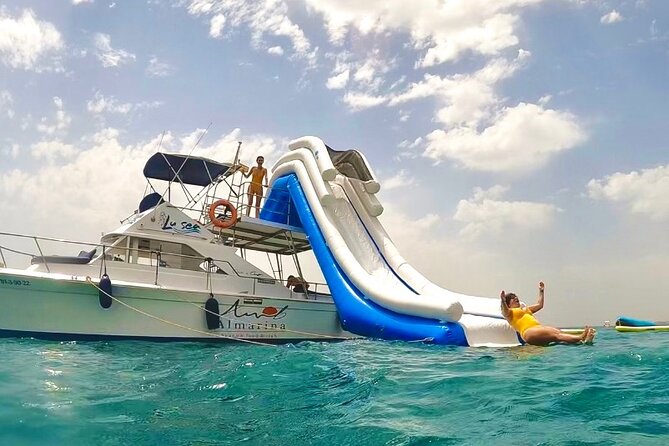Boat Tour with Snorkeling, Water Slide, Lunch and Pick Up - Paddle surf and kayaking: calmer water time without extra planning