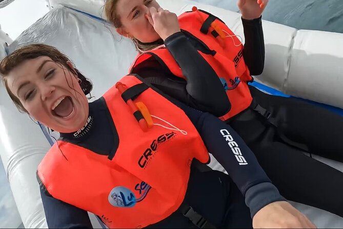 Boat Tour with Snorkeling, Water Slide, Lunch and Pick Up - Price and value: what you get for about $106.82
