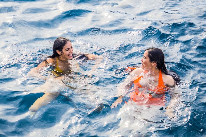 Catamaran tour with swimming stop in Malaga - Practical Tips: What to Wear and How to Enjoy the Swim Safely