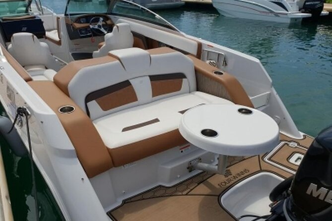 FourWinns HD240 boat rental for 10 people 4 hours - Getting oriented at Marina del Este (La Herradura) before you cast off