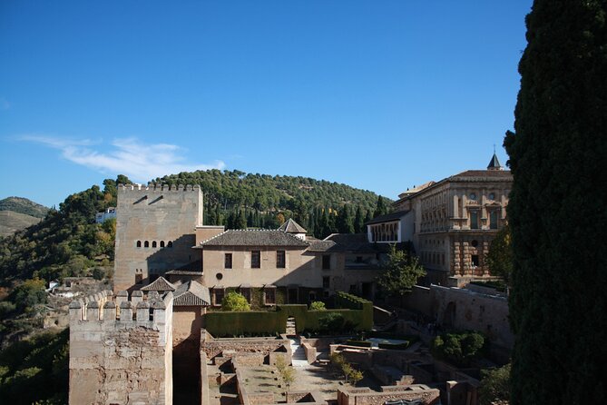 Full-Day Alhambra from Malaga: Choose Your Access & Pick Up Point - Entering the Alhambra: Alcazaba, Generalife, and Charles V in a guided loop