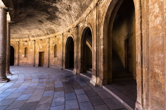 Granada Alhambra or Free Tour from Malaga - Coach travel support in English and Spanish: helpful, but watch the fine print
