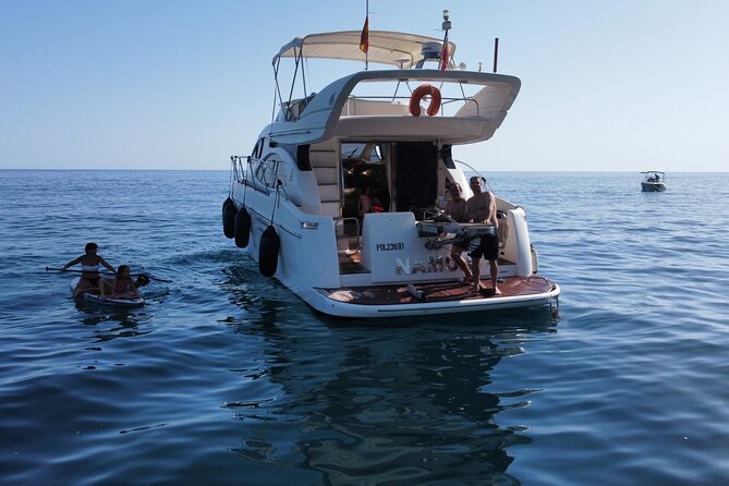 Luxury Yatch trips + Open Bar + Tapas + Paddle Surf + Snorkel - Snorkeling and Paddle Surf: How to Make the Water Time Count