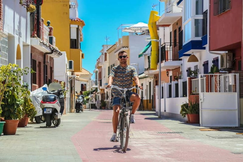 Malaga: Castle Hill and Fisherman Village E-Bike Tour - Why Gibralfaro and the beach are a smart pairing on one ride