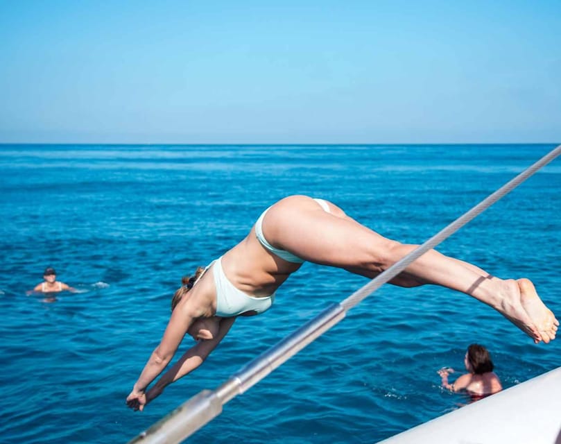 Malaga: Catamaran Sailing Cruise with Swimming & Optional DJ - Onboard bar service: drinks keep the mood going