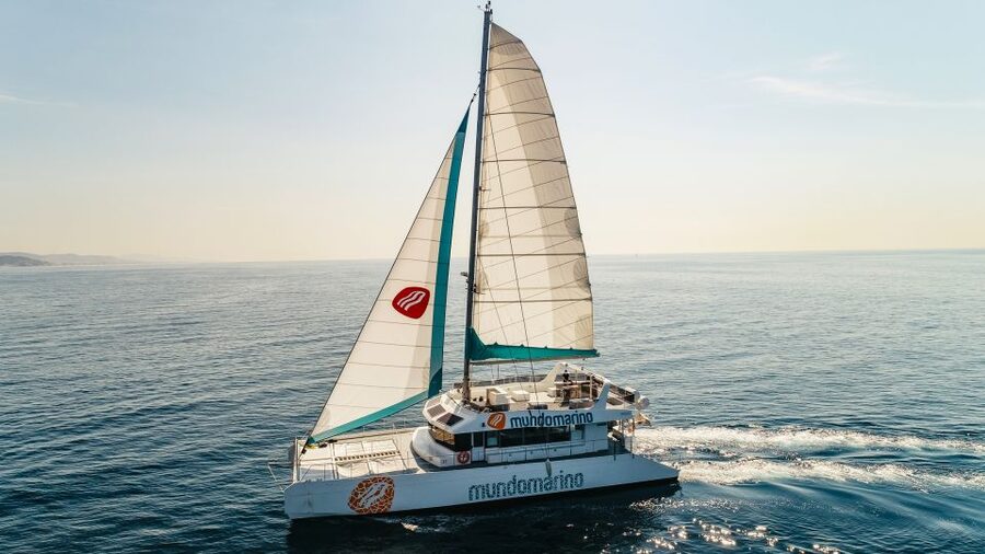 Malaga: Catamaran Sailing Cruise with Swimming & Optional DJ - Getting to the pier: meeting point changes with the option