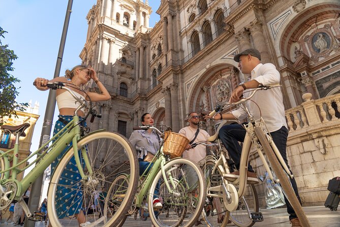 Málaga: City Highlights & Hidden Gems Guided Vintage Bike Tour - Key highlights you’ll feel right away