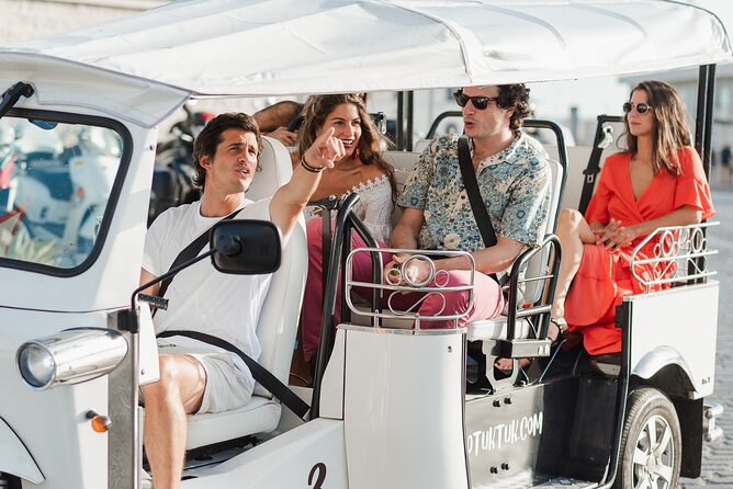 Malaga Expert Tour with Local Guide in Eco Tuk Tuk Private - Plaza de la Marina: the nerve center start in Centro