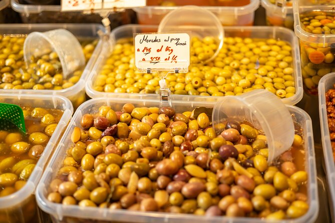 Malaga Food Tour with 12+ Tastings: Tapas, Olive Oil, Ham & More - Starting at Plaza Enrique García-Herrera: the quick story that sets your appetite