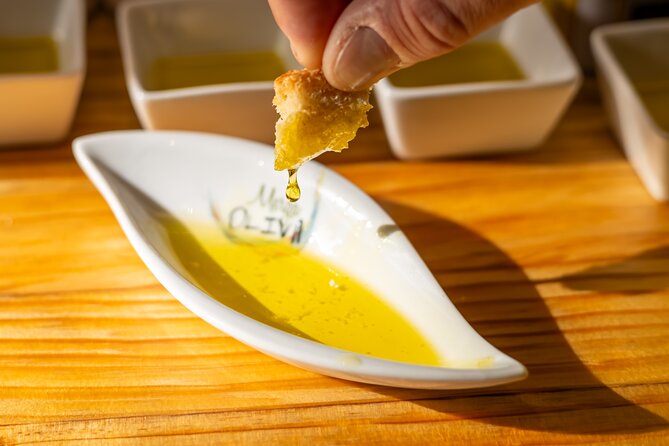 Malaga Food Tour with 12+ Tastings: Tapas, Olive Oil, Ham & More - Drinks included: vermut, wine, and beer without the guesswork
