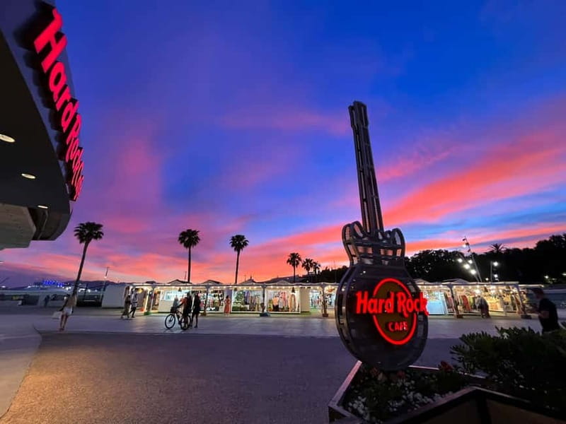 Malaga: Hard Rock Cafe Entrance with Lunch or Dinner - Rock classics, collectibles on the walls, and possible live performance