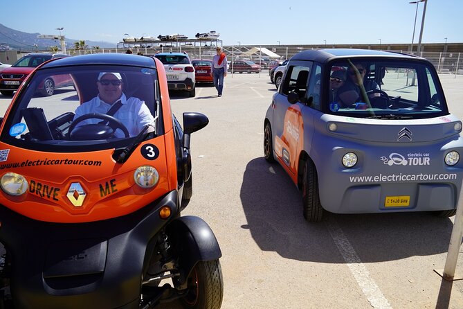 Malaga Highlights by Electric Car with Port Pick up - Malagueta along the Pablo Ruiz Picasso promenade