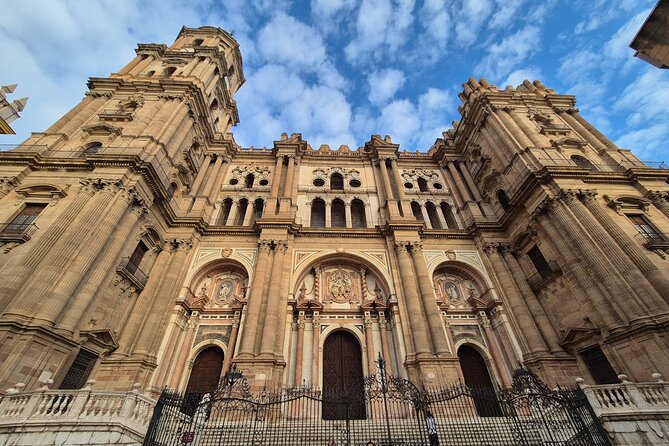 Malaga Highlights Shore Excursion with Tapas and Drinks - Teatro Romano de Málaga: Roman stone in a lived-in city