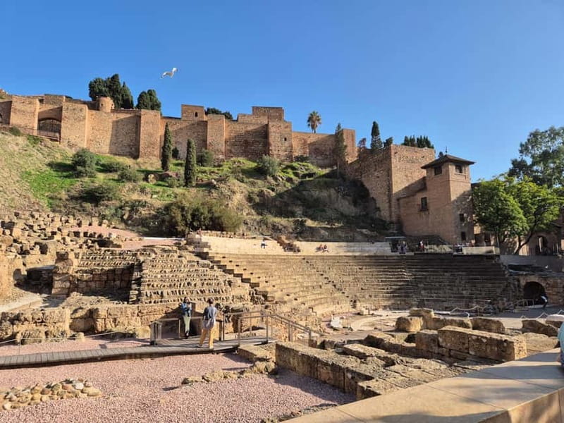 Málaga: Highlights Walking Tour with Drinks and Tapas - The Day’s Easy Ending: Calle Marqués de Larios