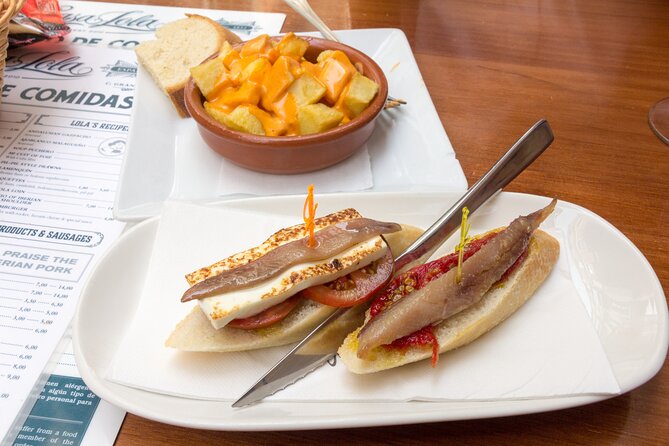 Malaga Market Food Tour: Tapas, Drinks, and Local Flavors - Key highlights that make this tour worth your time