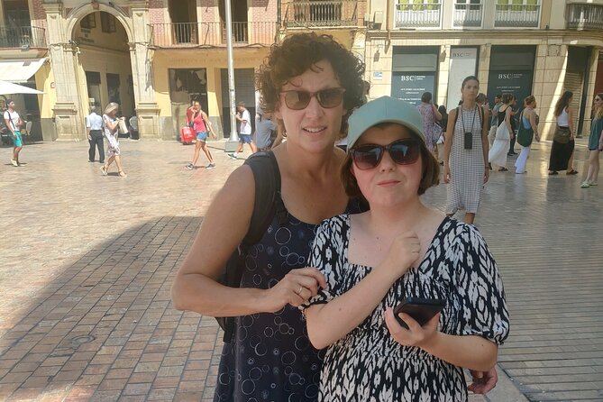 Malaga Scavenger Hunt and Sights Self-Guided Tour - Stop 3: Plaza de la Merced for breaks and clever prompts