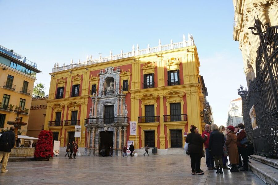 Malaga: Skip-the-Line Malaga Cathedral Tickets with Tour - Entering the cathedral: construction periods, artistic styles, and the nickname La Manquita