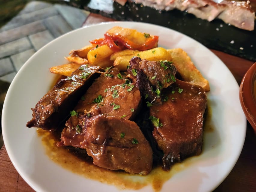 MALAGA: ULTIMATE FLAMENCO & TAPAS TOUR - Ultramarinos stop: cured meats and sweet vermouth choices