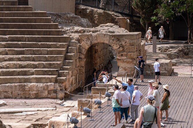 Malaga Walking Tour, Roman Theatre and Alcazaba with Tickets Included - Plaza de la Constitución and Plaza del Obispo: quick city anchors