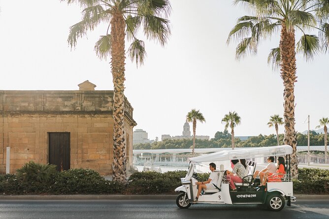 Malaga Welcome Tour with Local Guide in Eco Tuk Tuk Private - Bank of Spain Branch and Malaga Town Hall: Power Centers of the City