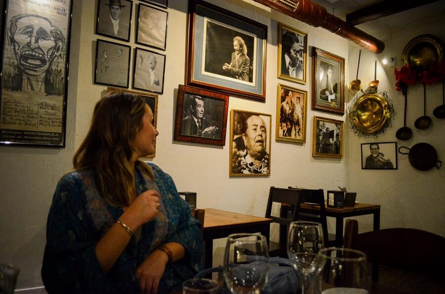 Málaga: Wine & Tapas Tour - Stop 2: sausage, cheese, and vermouth in a cozy bar setting