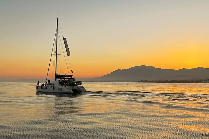 Marbella Small Group Catamaran with Dolphin Watching - Stop time at anchor: swims, paddle surf, snorkel, fishing