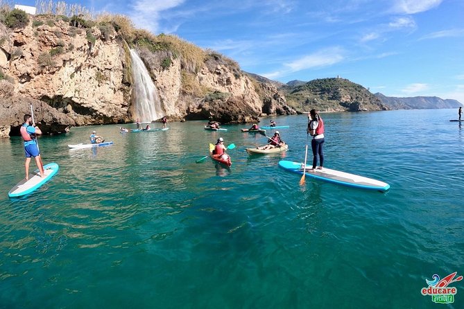 Paddle Surf Route Cliffs Nerja and Cascada de Maro + Snorkel - Cascada Doncella: paddling past waterfall energy