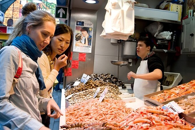 Paella Cooking Class with English Guide in Malaga - The main event: seafood paella, plus smart options