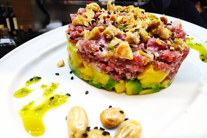 PREMIUM TAPAS TOUR: Paella, Market Tastings, and Winery - The paella lunch: where location meets the main event