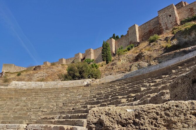 Roman Theatre and Alcazaba of Málaga Tour - Starting at the Glass Pyramid: how the morning sets you up