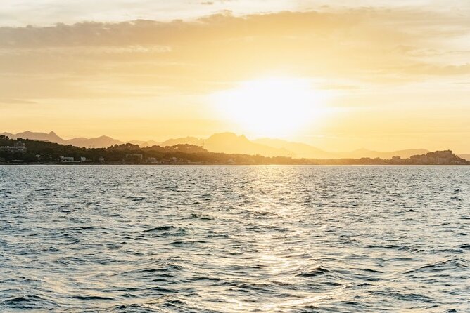 Sunset or night catamaran tour from Malaga - Muelle Uno meeting point: show up early and use the area